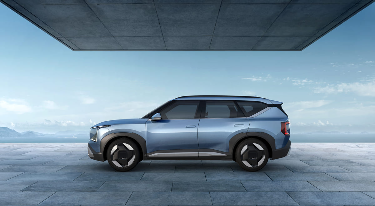 A 2021 Honda e displayed in a studio setting, showcasing its sleek design and modern features.