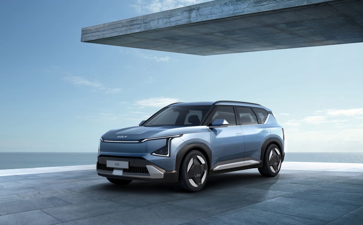 A new SUV parked on a concrete slab, showcasing its modern design and sleek exterior.