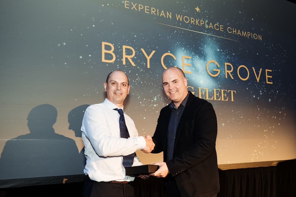 Bryce Grove, National Manager of Trade Operations at SG Fleet, receiving the Workplace Champion Award at the Financial Services Federation Awards.