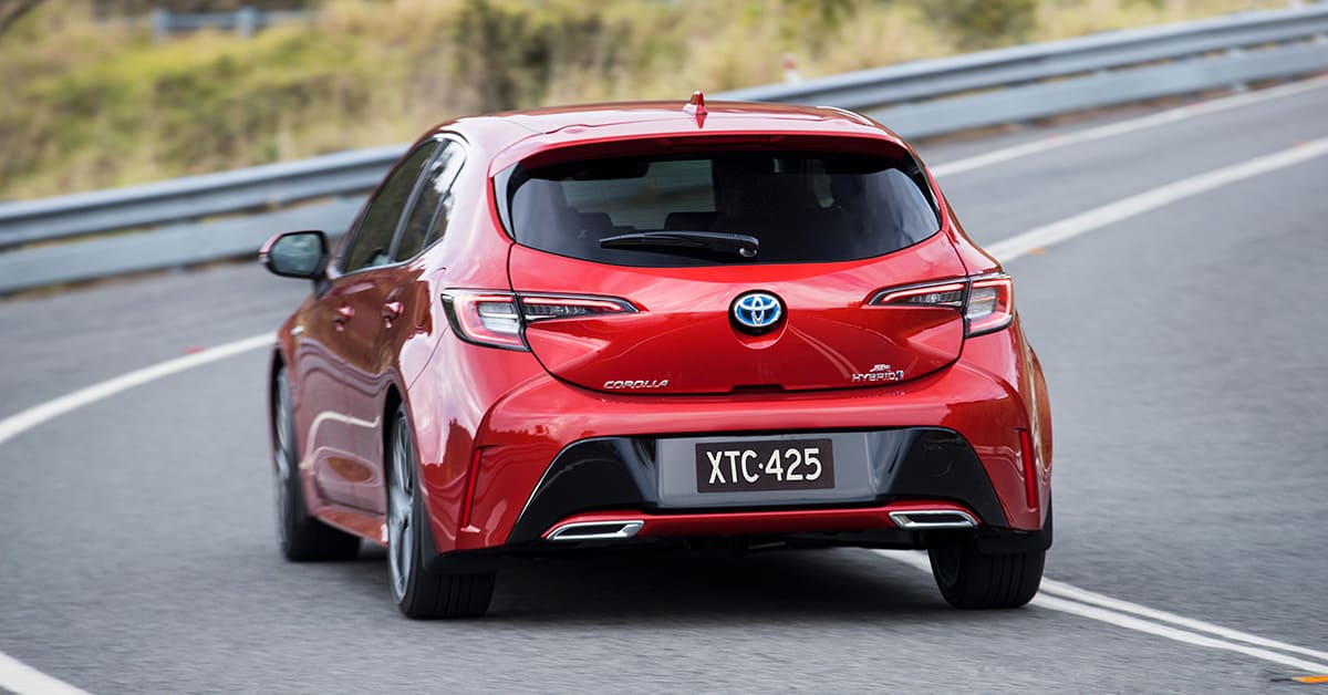 Compact Toyota i-Pace hatchback, showcasing its sporty design and emphasizing the joy of driving.