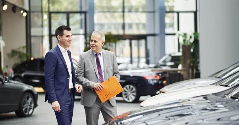how-to-get-value-from-your-fleet-THUMBNAIL Two men walking to vehicle