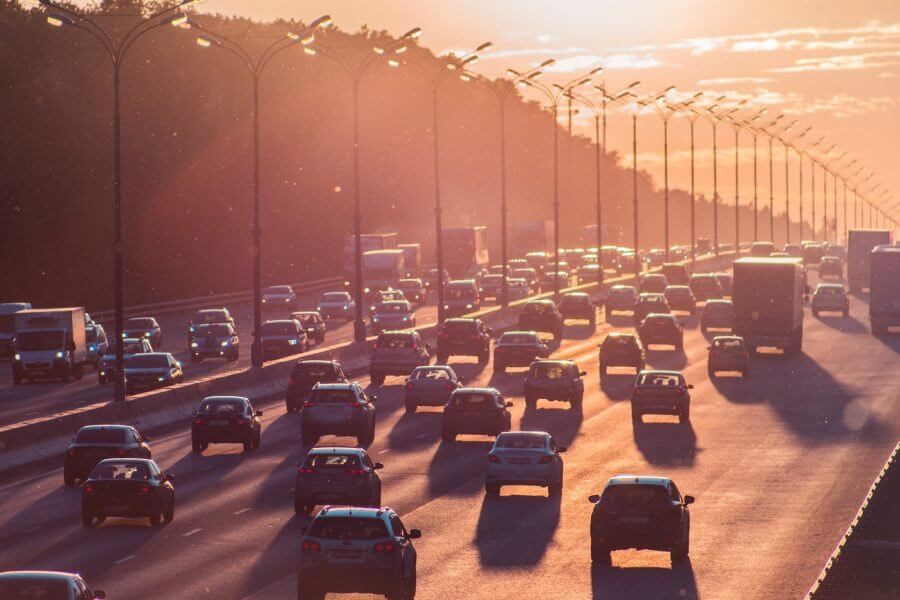 Cars driving in sunset