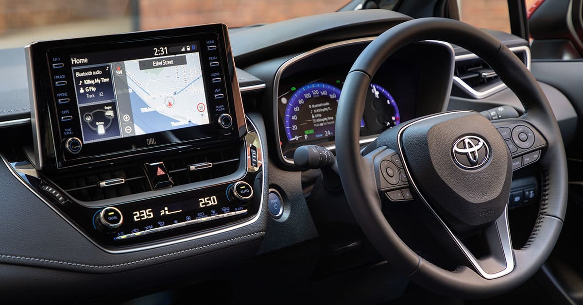 The interior of a 2020 Toyota RAV4, showcasing modern design, spacious seating, and advanced technology features.