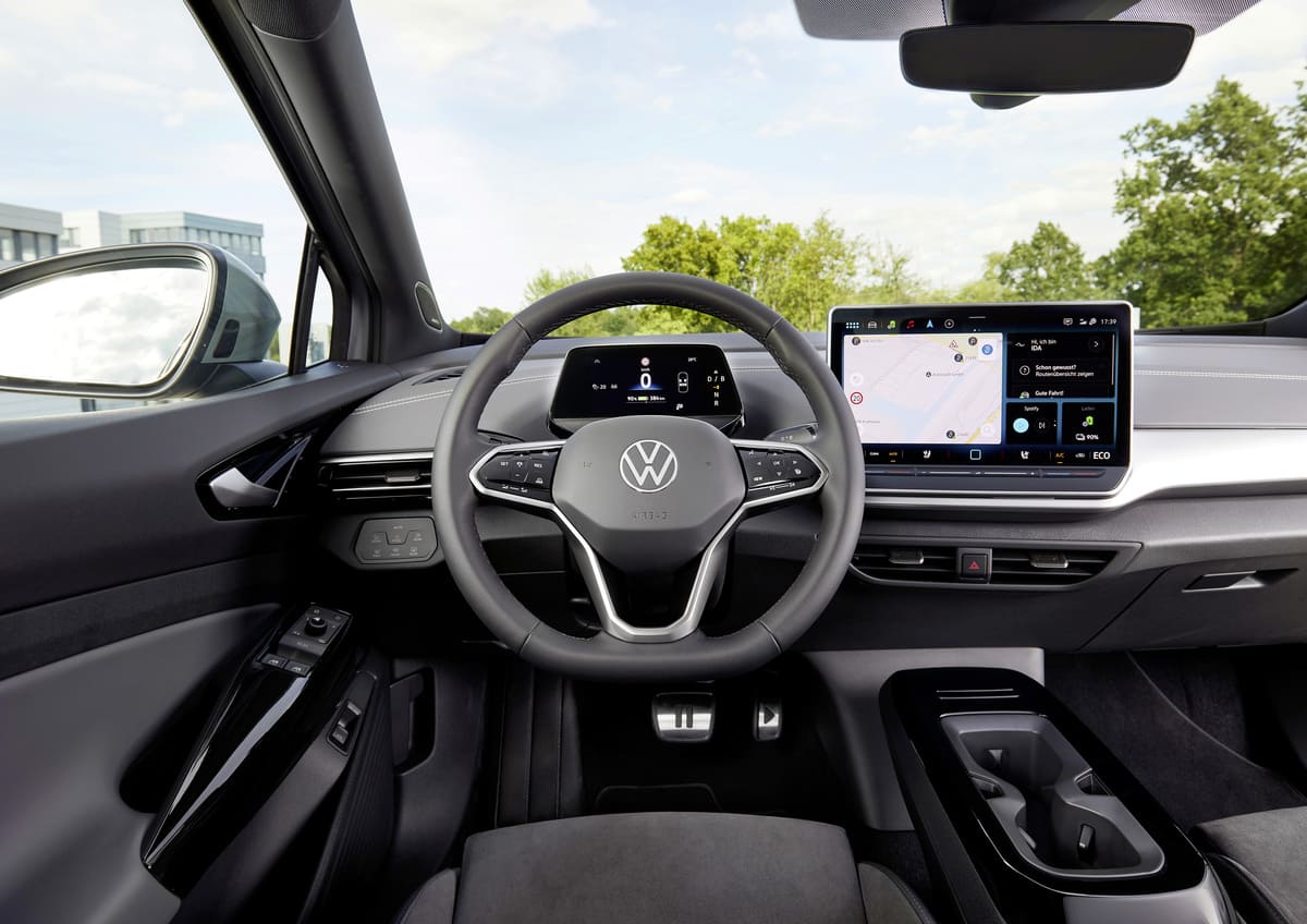 The interior of a Volkswagen e-up, showcasing modern design, digital dashboard, and eco-friendly materials.
