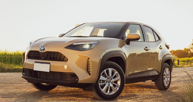 Toyota C-HR, a compact crossover SUV, showcasing its sleek design and modern features in an urban setting. Toyota C-HR, a compact crossover SUV, showcasing its sleek design and modern features in an urban setting.