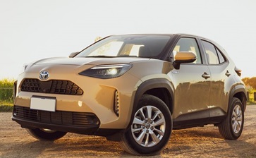 Toyota C-HR, a compact crossover SUV, showcasing its sleek design and modern features in an urban setting. globalblog'