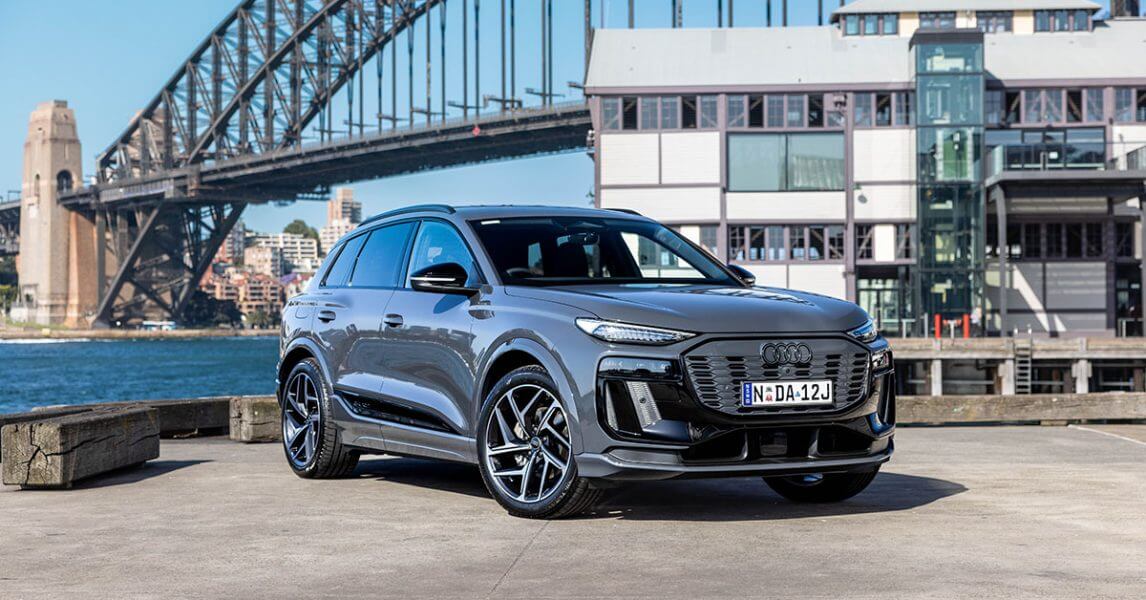 Vehicles coming to australia- blue car in Sydney Harbour