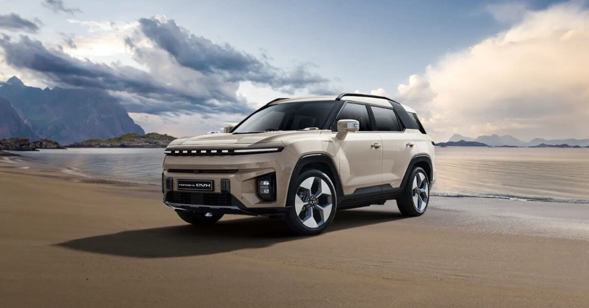 Vehicles coming to australia- Cream coloured car on beach
