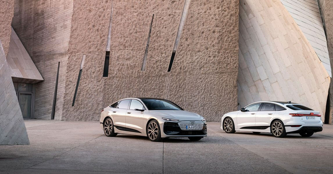 Vehicles coming to australia- two cars at sandstone building