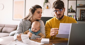 young-couple-calculating-the-cost-living