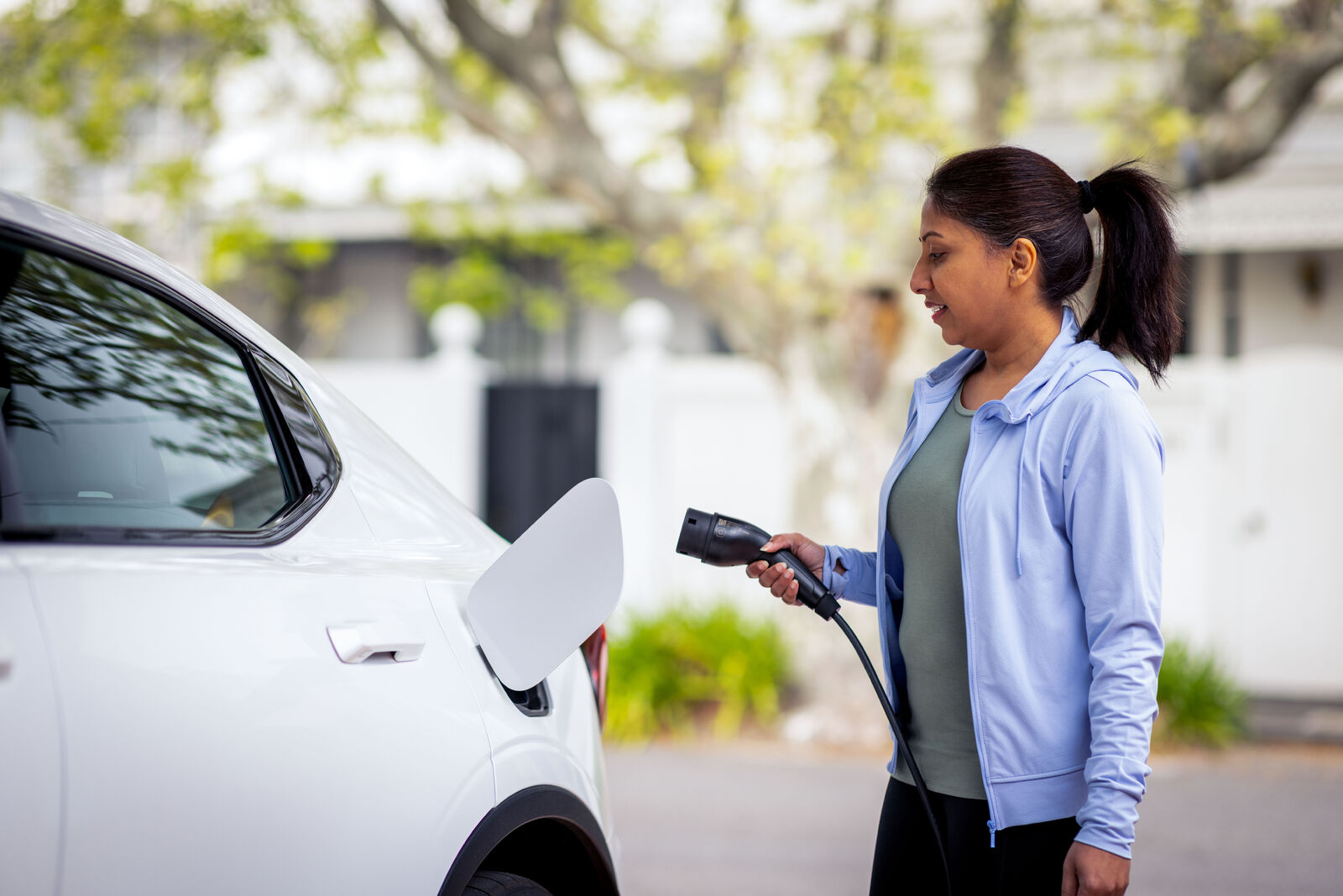 SG_Fleet_Melb_EV_Charging_5_Sept24-medium Woman charging electric vehicle