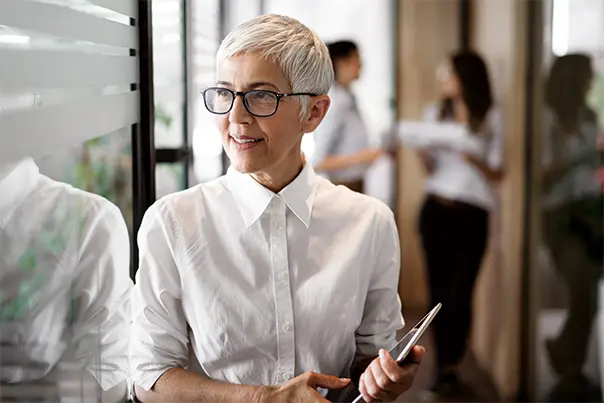 Business woman holding tablet