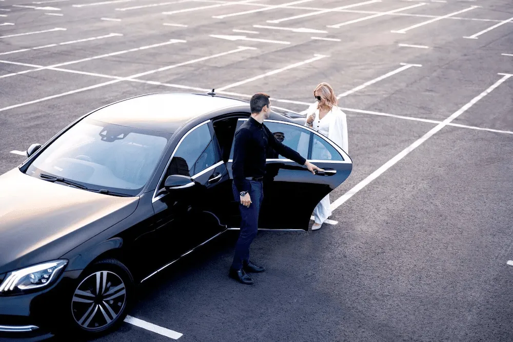 Person opening a car door