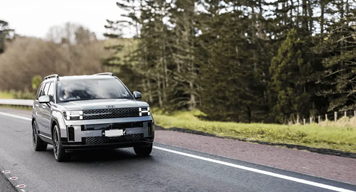 SUV driving on New Zealand motorway