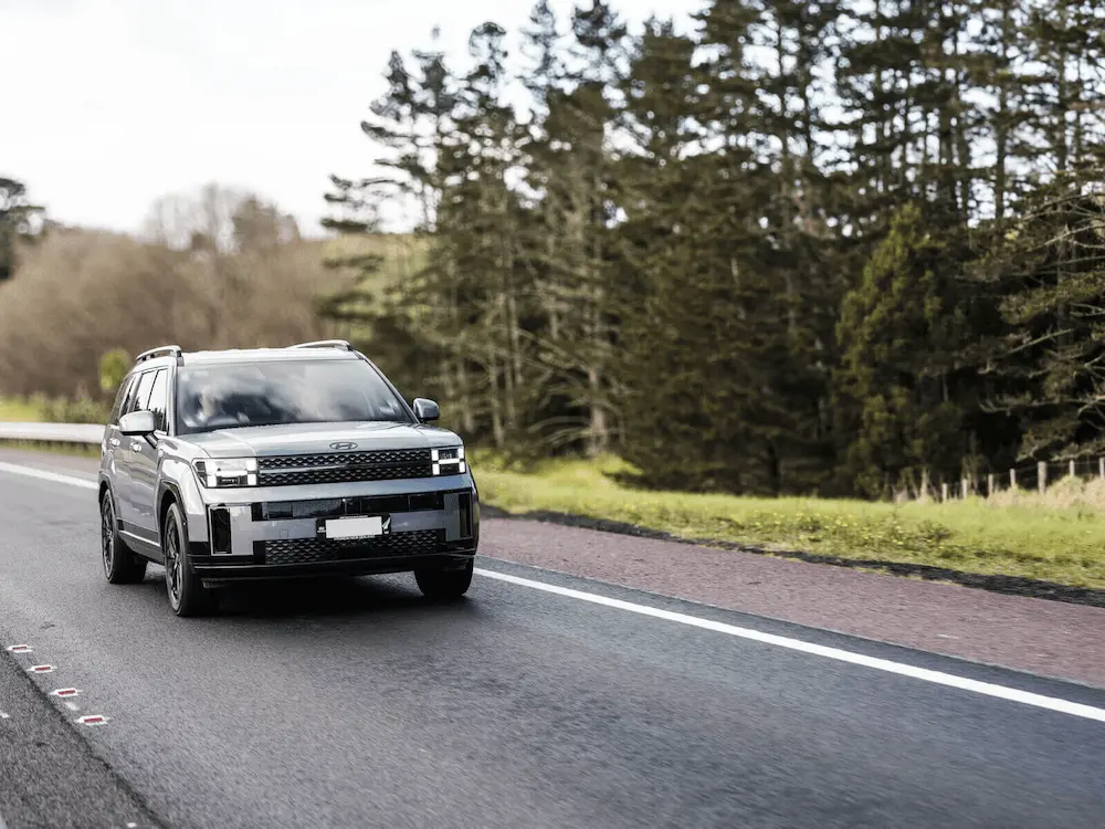 SUV driving on New Zealand motorway
