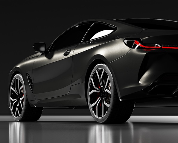 rear-view-of-black-premium-car-in-studio-light