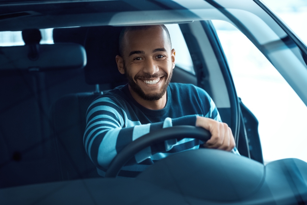 Driving change mental health awareness A happy driver on world mental health awareness day