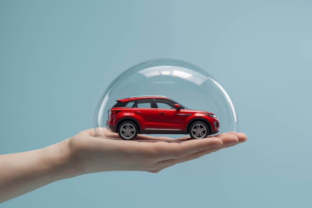 OEM- car manufacturer neutral fleet company bubble Red car protected under a glass dome, symbolising the security of OEM car parts, car manufacturing quality and fleet company support.